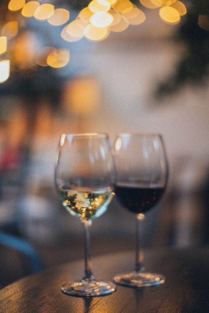 two wine glasses on a blurry background